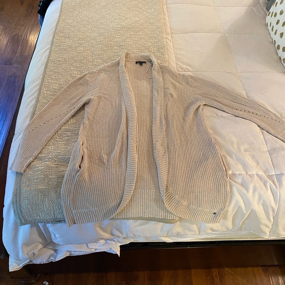 Cream knit sweater with pockets